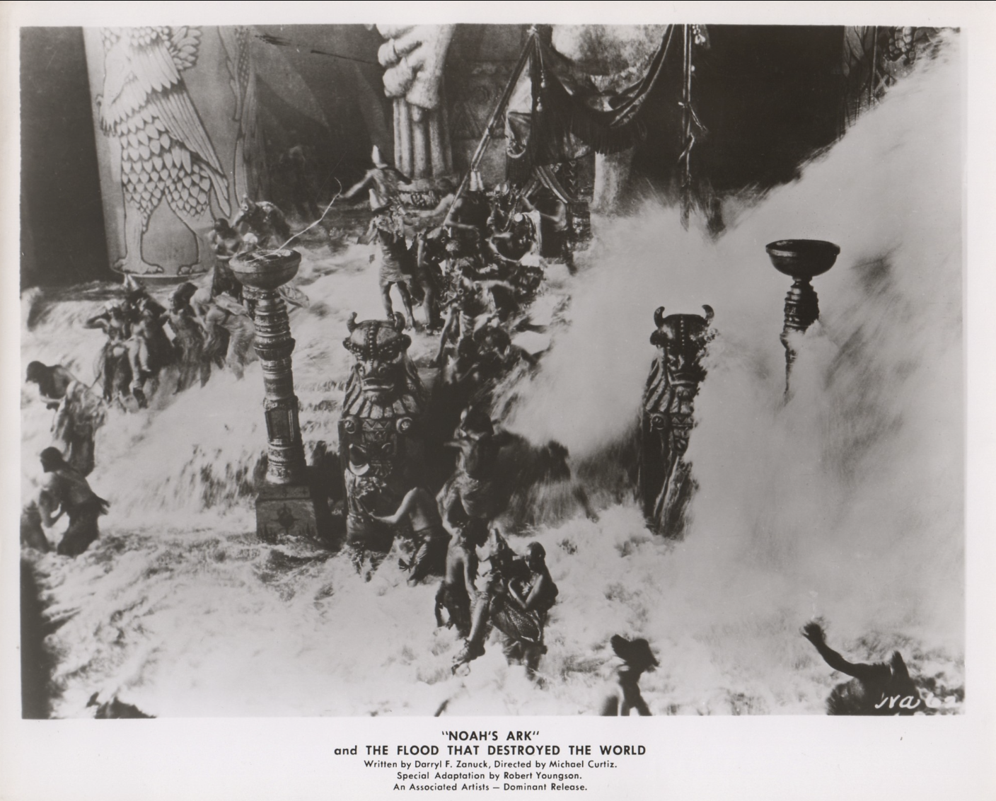 I don't know if it qualifies as a "stunt" along the lines of what you're thinking of, but according to legend Curtiz actually flooded the set to film a flood scene in his production of Noah's Ark, which led to the death of multiple extras and injuries for much of the leading cast.
